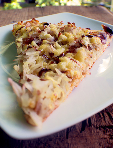 A slice of potato pizza